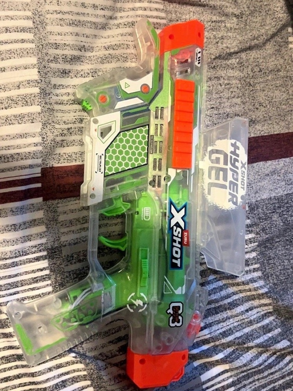 X-Shot Excel Crusher Toy Blaster Green Orange Like New come With charger and orb